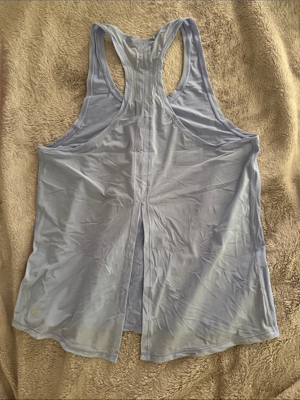 Baby blue Lululemon workout tank with cute cutout back.